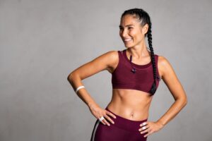 Woman smiling in gym outfit